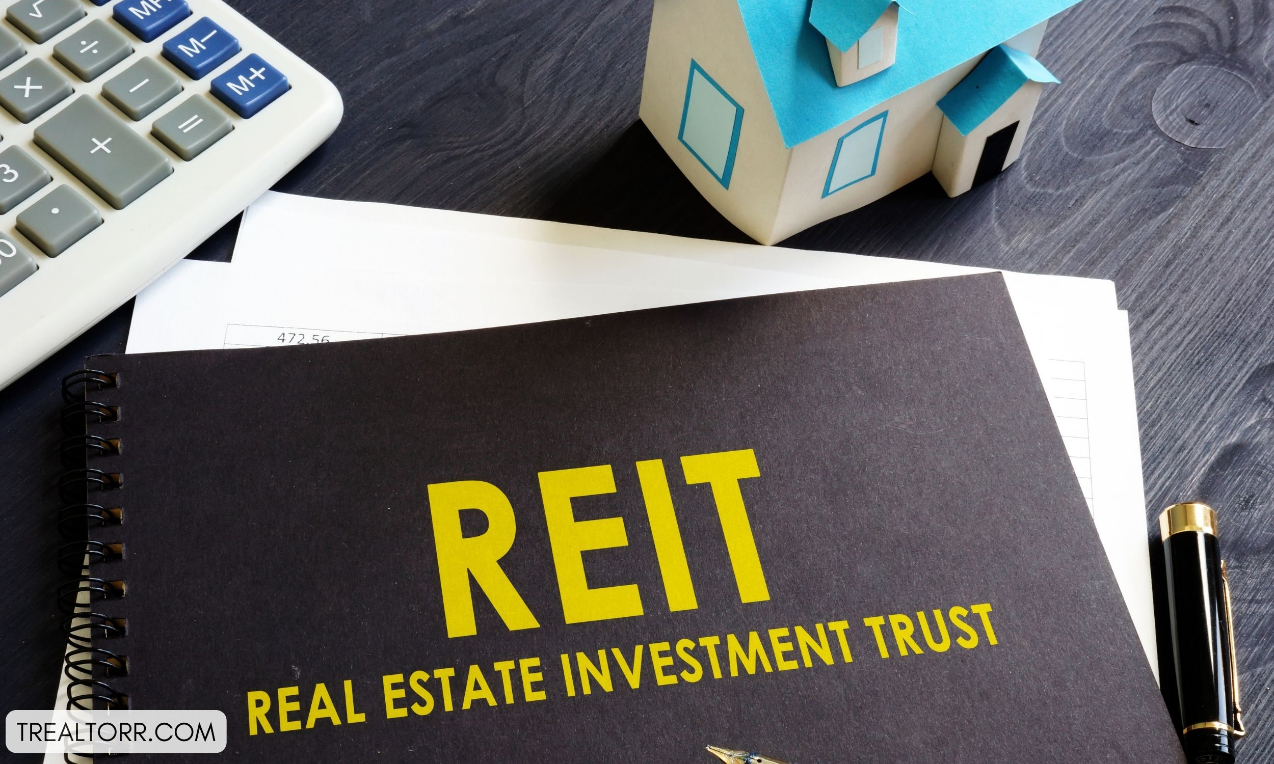 How to invest in real estate through a real estate investment trust (REIT)?