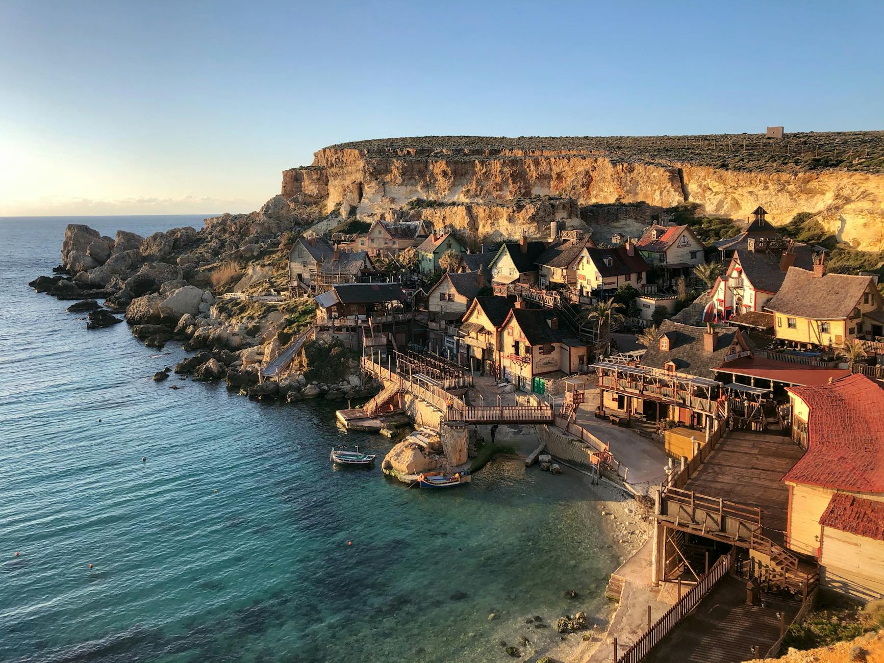 wide angle photography of buildings beside seashore 2. Malta