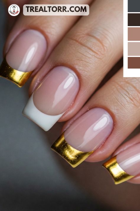 A close-up of French tip nails with metallic gold tips, giving a chic and updated twist to the classic French manicure.