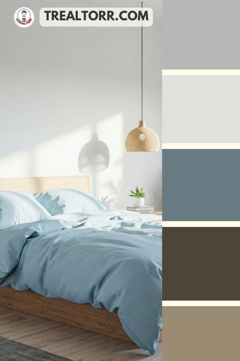 A bedroom with sky blue bedding, white walls, and natural wood furniture, creating a tranquil and spacious atmosphere.