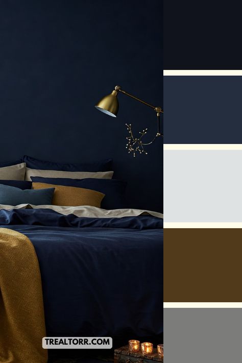 "A cozy bedroom with midnight blue walls, navy bedding, and soft gold accents, creating an elegant and calm winter vibe."