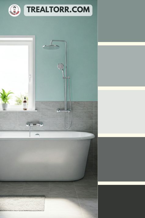 A bathroom with cool gray tiles, seafoam green walls, and silver fixtures, evoking a clean and refreshing summer look.