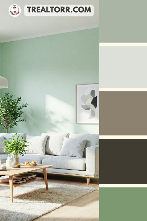 A living room with mint green walls, cloud gray sofas, and light wooden decor, creating a peaceful and inviting space